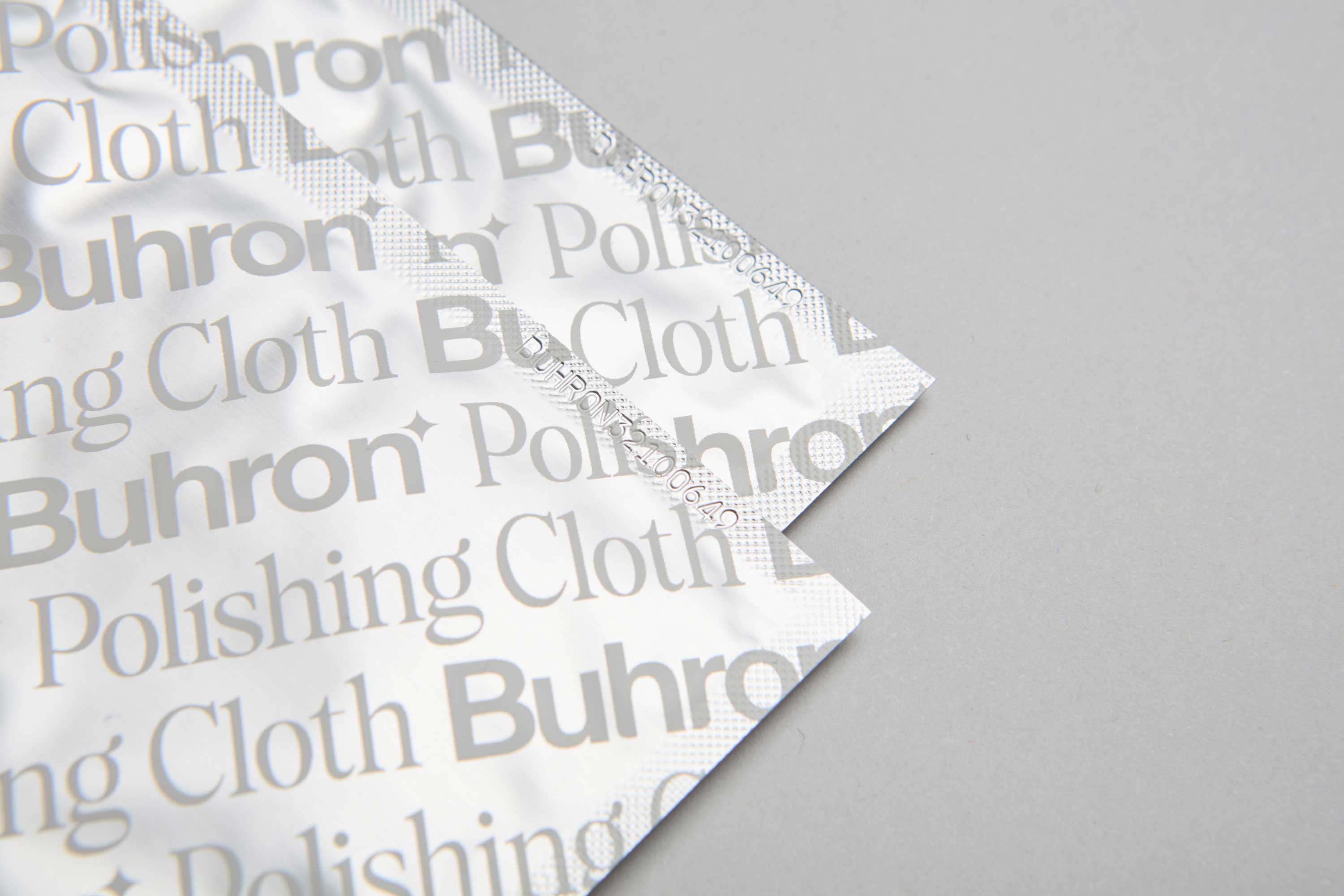 Individually sealed impregnated polishing cloth for removing tarnish and scratches from silver and gold jewellery