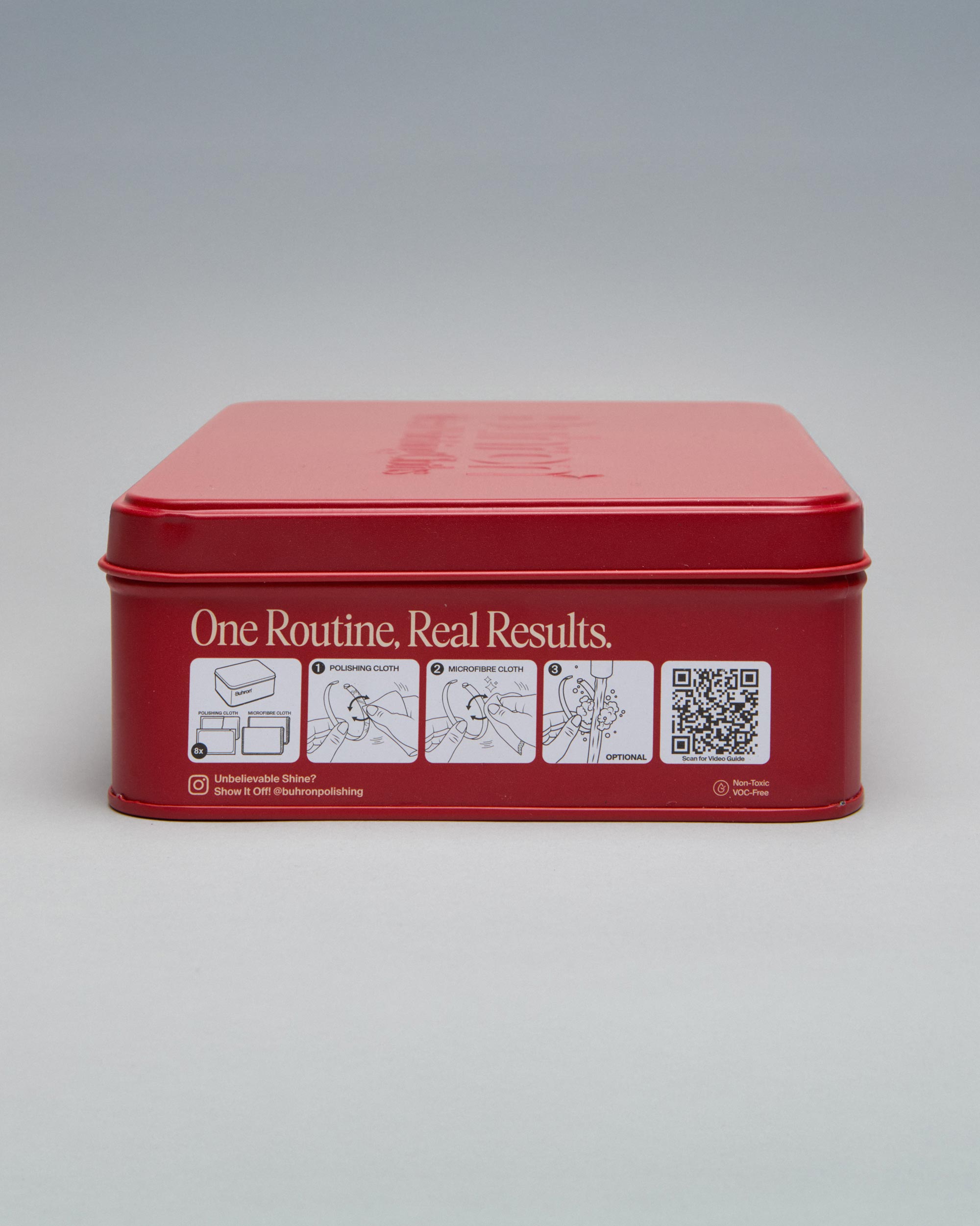 Buhron jewellery polishing kit tin showing two-step usage instructions for tarnish and scratch removal